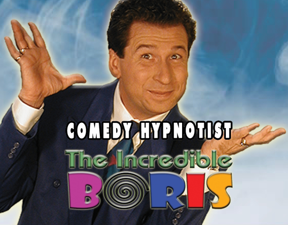 Promotional image of a man in a blue suit with hands up, text reads “The Incredible BORIS” in colorful letters against a green gradient background.
